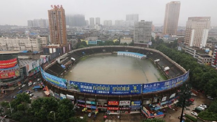 Flooding kills more than 180 people in central and southern China